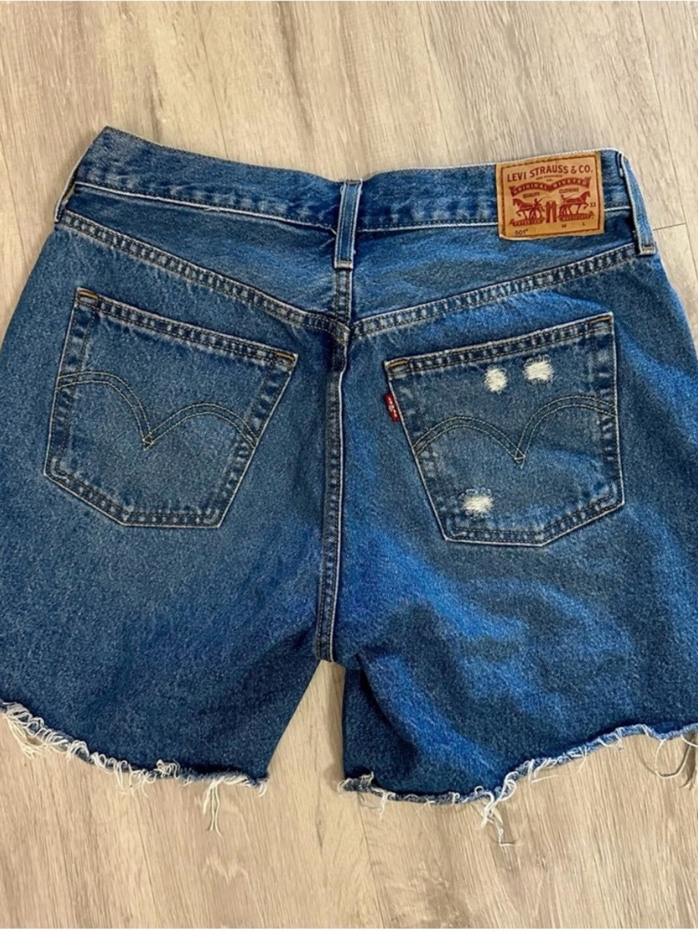 Levi's Dark Blue Distressed Denim Cutoff Shorts